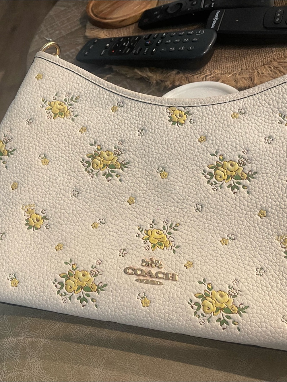 Coach White Pebbled Leather Crossbody with Yellow Floral Motif